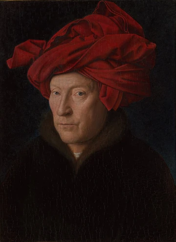 赤い頭巾を巻いた男性がこちらを見る1433年の肖像。ヤン・ファン・エイクの自画像の可能性があるが、人物の身元は確定していない。